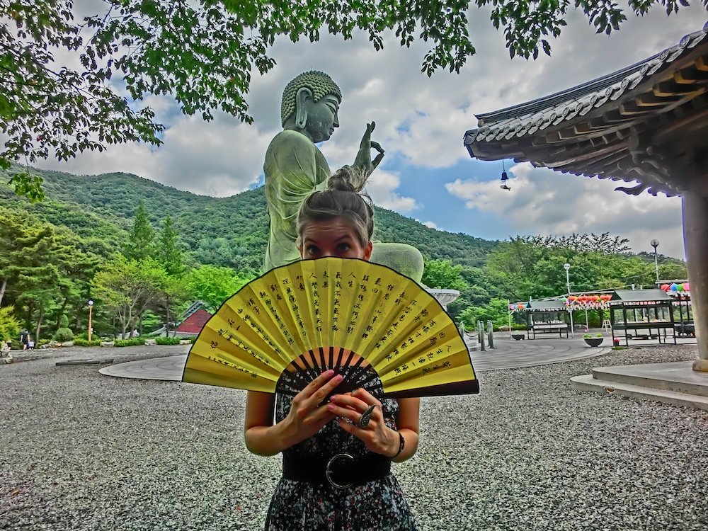 That Backpacker Audrey Bergner with a fan Buddha in Cheonan, Korea 