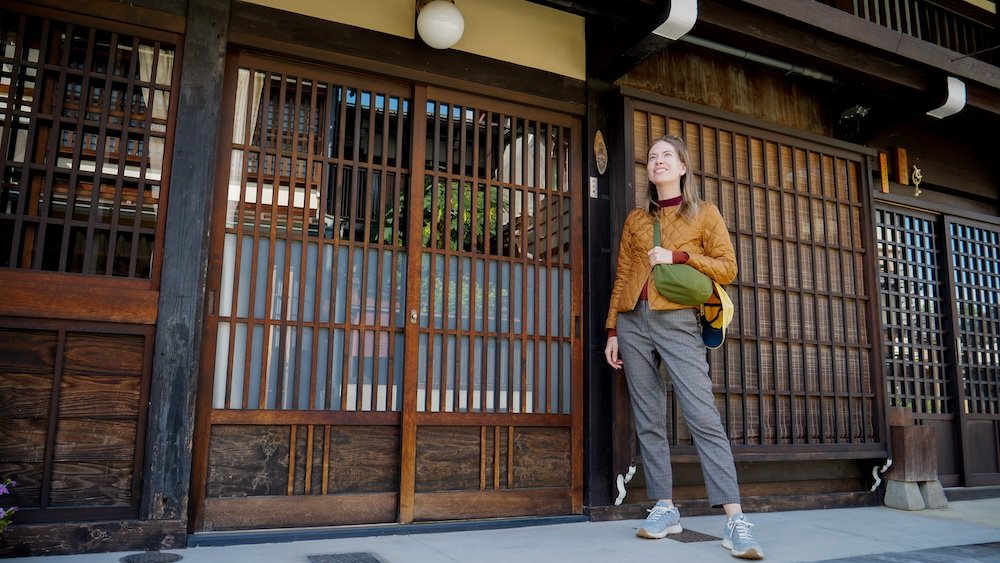 That Backpacker posing in Sanmachi Suji in Takayama is a beautifully preserved historic district in Japan