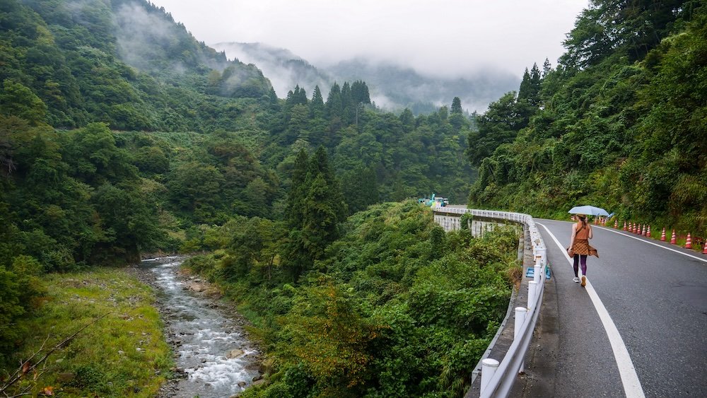 That Backpacker walking alongside the road edge towards Kiyotsu Gorge