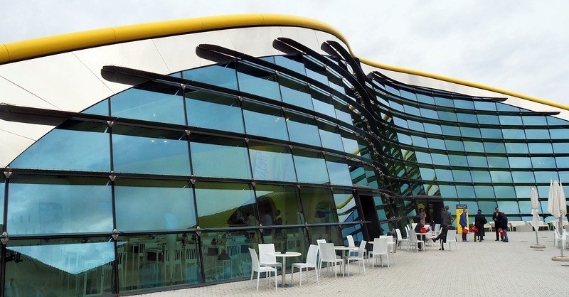 The Enzo Ferrari Museum is shaped like a ferrari engine hood