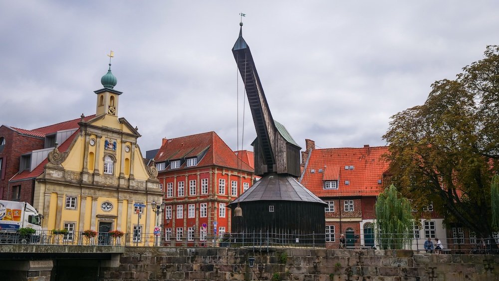 The impressive and iconic Old Crane along the Ilmenau River in Luneburg old town of Germany