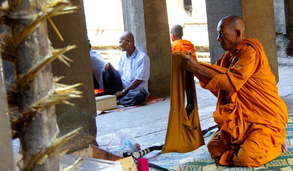 This is a photo of a Cambodian buddhist monk at Angkor Wat Temple in Siem Reap, Cambodia 