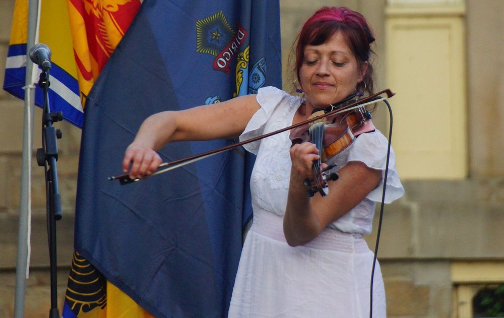 This is a shot of a talented French Acadian violinist performing at the New Brunswick Highland Games in Fredericton, Canada