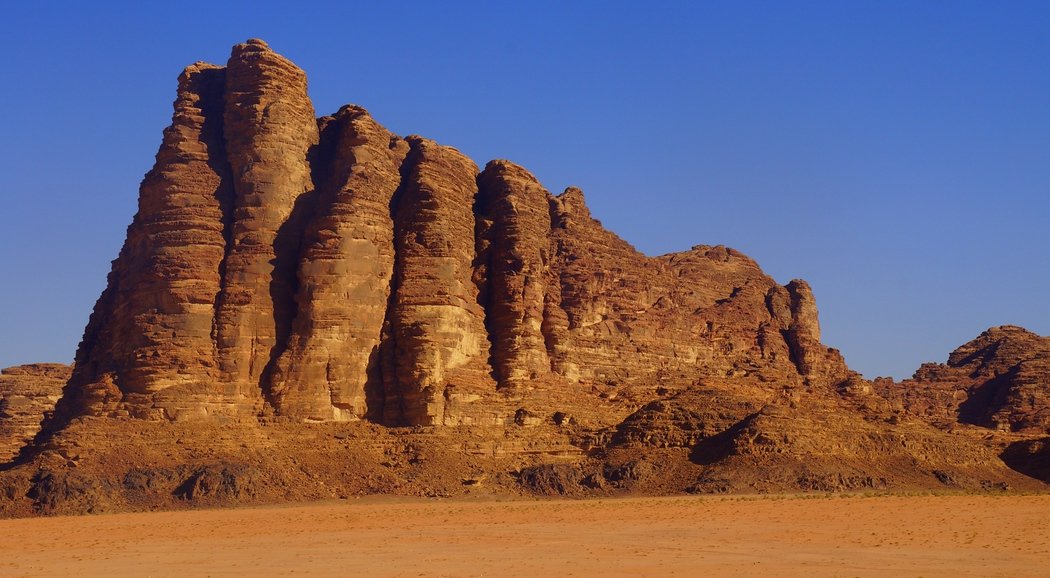 This is a shot of Seven Pillars of Wisdom Mountain in Wadi Rum, Jordan taken just after lunch. Can you spot all seven?