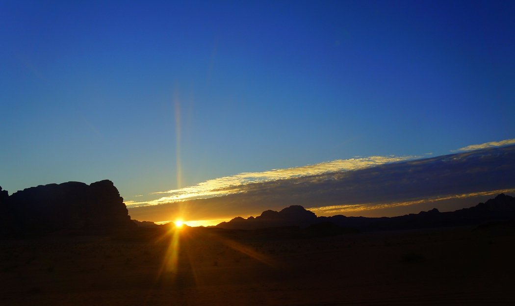 This is another perspective shot of rock formations during sunset in Wadi Rum, Jordan. This was the nicest sunset we witnessed during our entire time in Jordan.