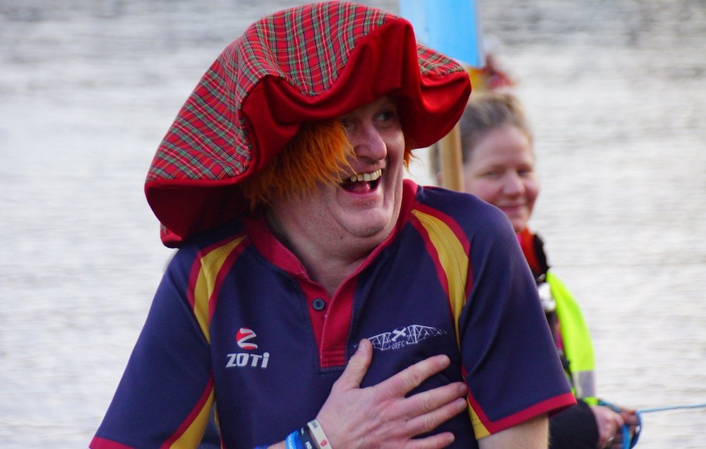  This man beams a radiant smiles during the Loony Dook festivities at the Firth of Forth