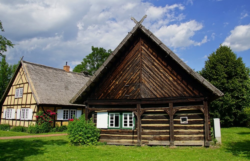 Traditional homes in Spreewald, Germany with thatched a-frame structures and rooftops