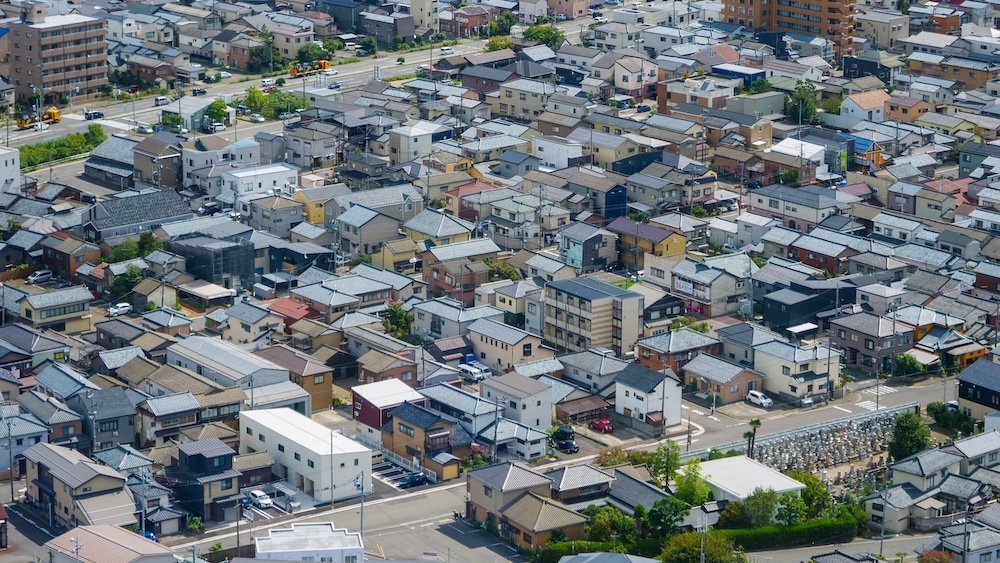 Traditional Japanese houses and rooftops from a high vantage tower perspective in Niigata, Japan