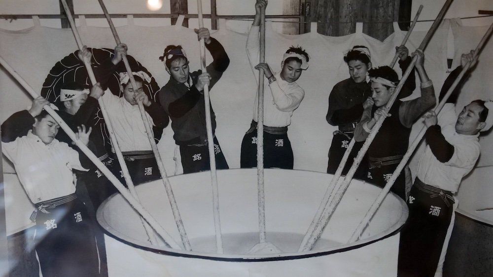 Traditional sake making process in Nagano, Japan from a vintage photo