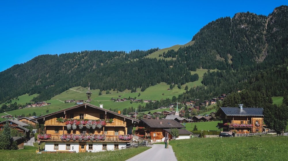 Traditional Tyrolean houses reached by foot in Tyrol, Austria 