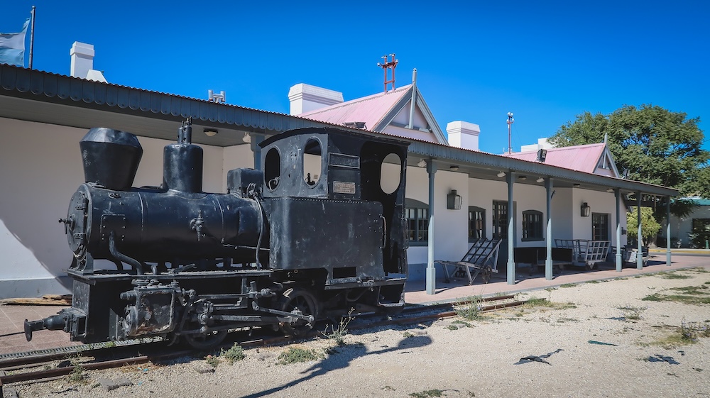Trelew Patagonia Museo Regional Pueblo de Luis historic railway locomotive outside the museum building in Chubut Argentina highlighting the transportation history of the Welsh settlement towns in the Lower Chubut Valley.