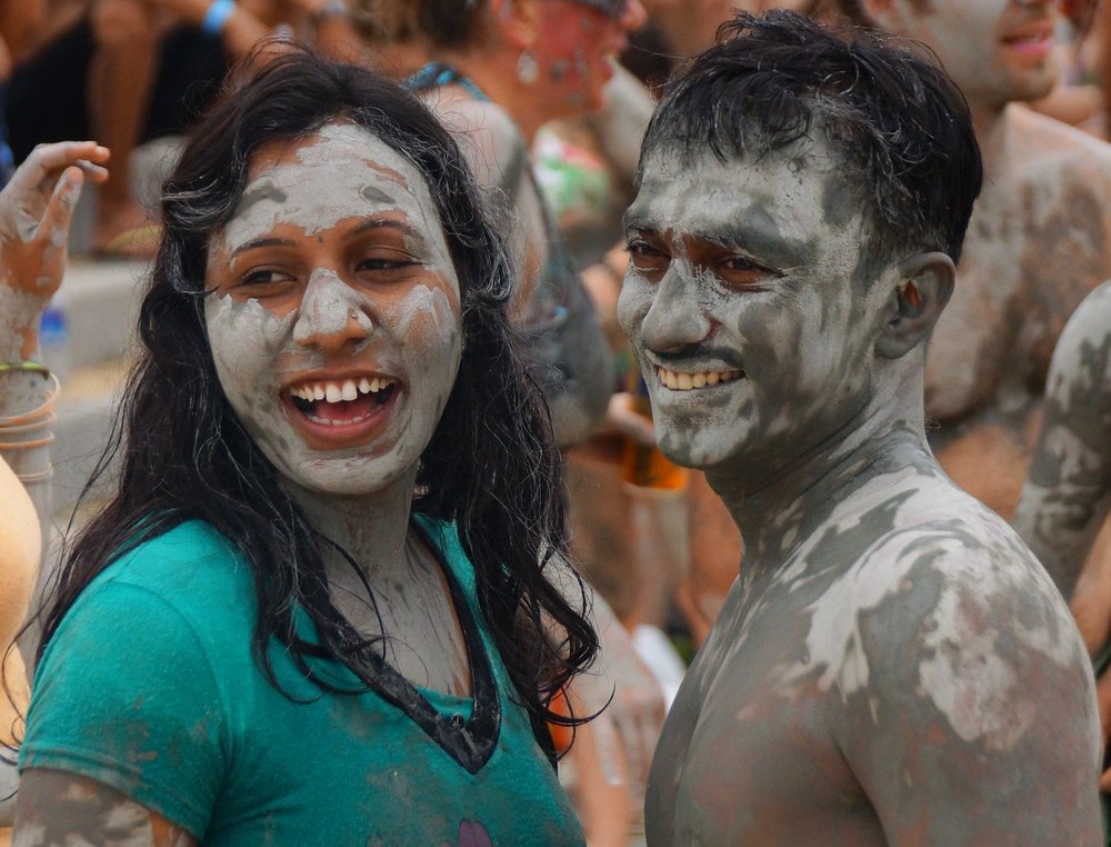 Two foreigners enjoy a candid smile near the mosh pit / concert area of the Boryeong Mud Festival