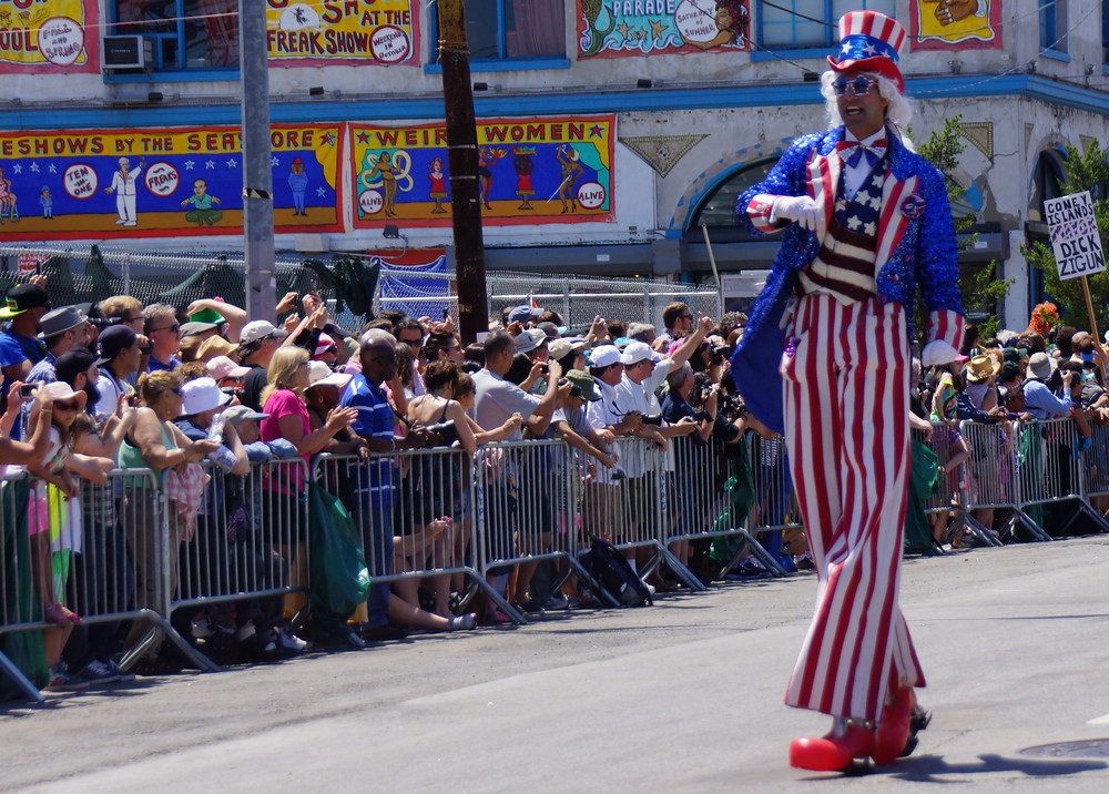Uncle Sam on stilts walking during the Mermaid Parade on Coney Island New York City