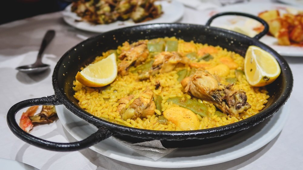 Valencia paella pan with ingredients in Spain 