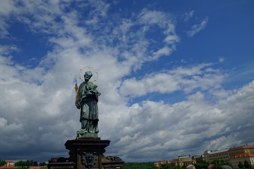 Views from Charles Bridge in Prague with imposing sky in the background