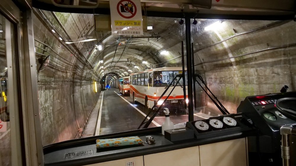 Views from inside the Tateyama Tunnel Trolley Bus as we crossed Mount Tateyama through a narrow tunnel 