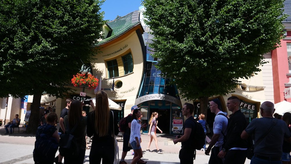 Views of the Crooked House Krzywy Domek along Monte Cassino Street in Sopot, Poland