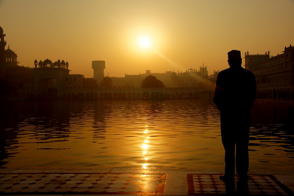 Waking up early in the morning to visit the Golden Temple afforded me the opportunity to walk around without the crowds. This man stood in awe for several minutes.