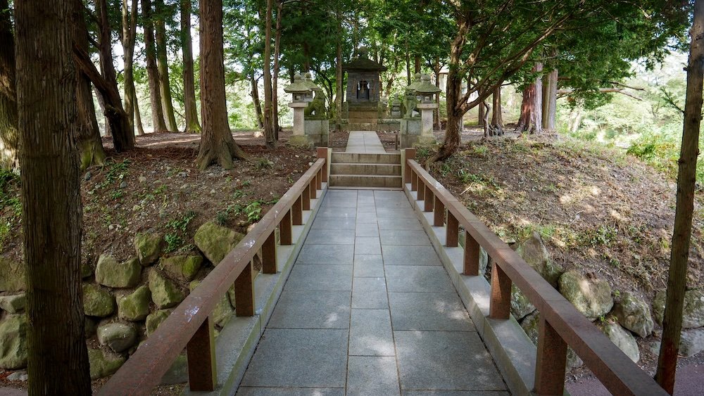 Walking path leading to a shrine at Daio Wasabi Farm