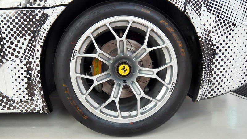 Wheel perspective shot of a Ferrari at the Enzo Ferrari Museum