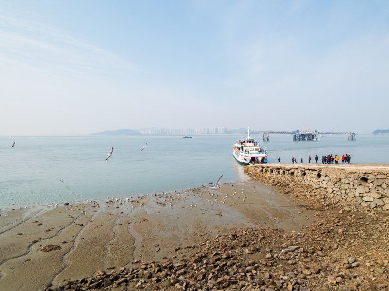 Wolmido seascape views with passengers heading towards boarding a ferry in Incheon