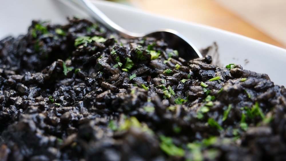 Wonderfully savory black risotto for lunch in Split, Croatia 