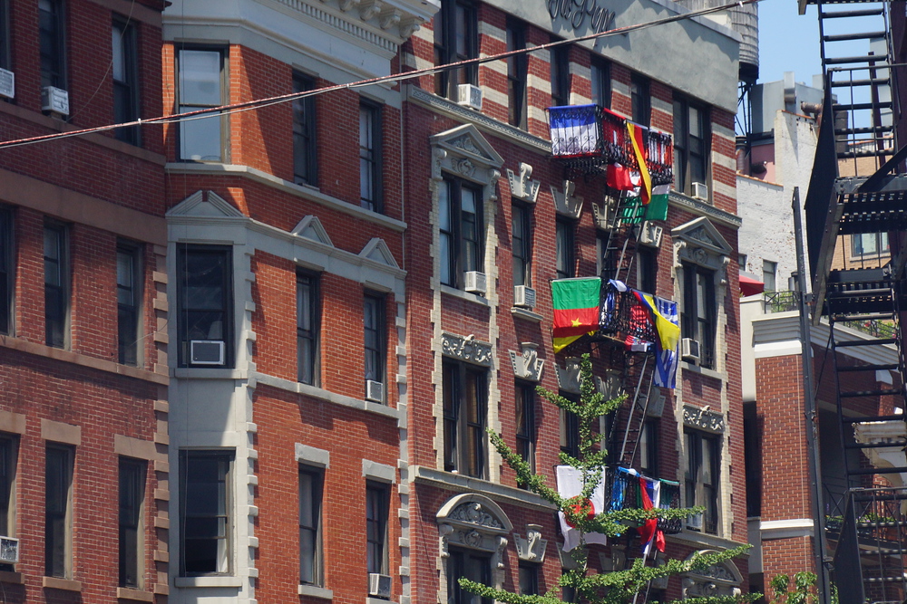 World Cup soccer flags hanging from an apartment building in DUMBO, Brooklyn New York City