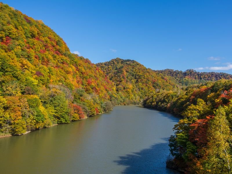 Yubari river with autumn colors in Japan 