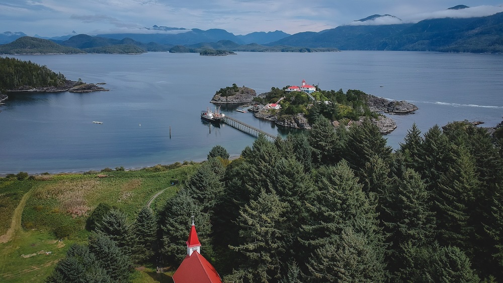 Yuquot also known as Friendly Cove aerial views overlooking the island with the Uchuck III off in the distance 