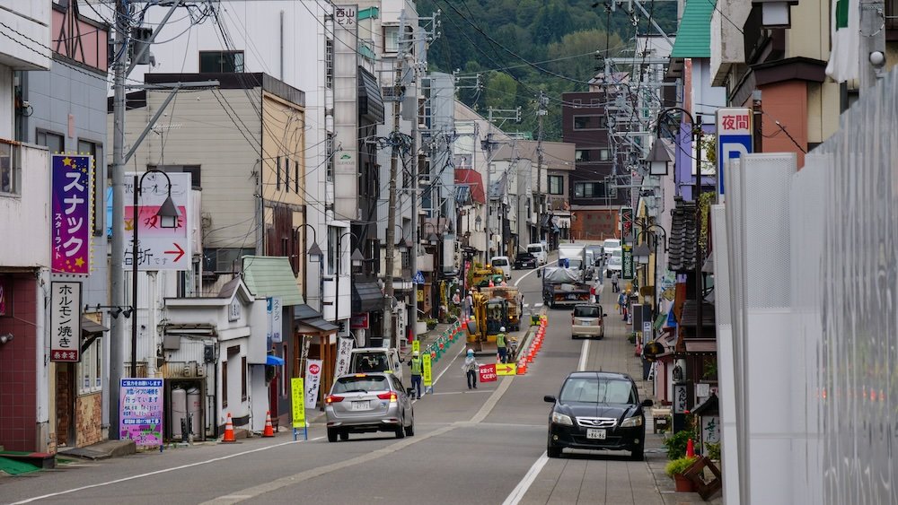 Yuzawa street scene with cars 